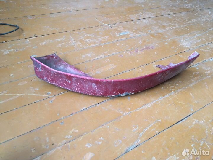 Клык бампера lancer 10