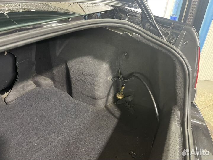 Обшивка багажника Opel Astra H седан