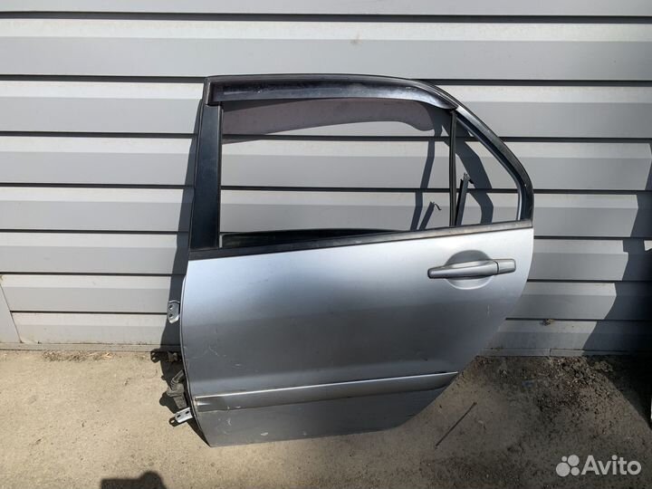 Дверь задняя левая Lancer 9