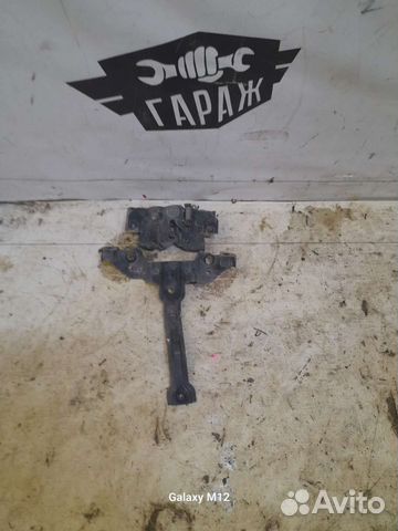 Замок капота Mazda Demio de