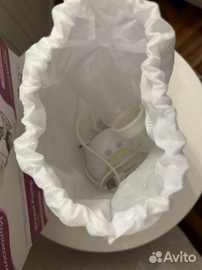 Молокоотсос электрический ndcg