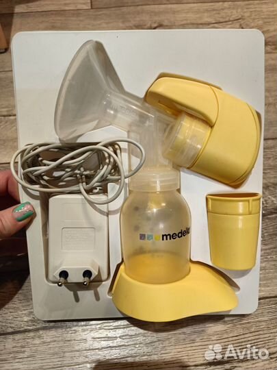 Молокоотсос medela электрический