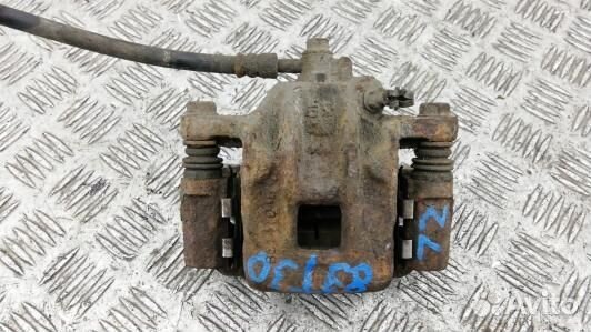 Суппорт тормозной задний левый hyundai santa FE 1