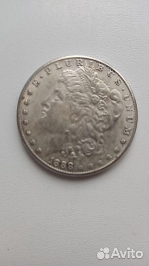 Монета доллар