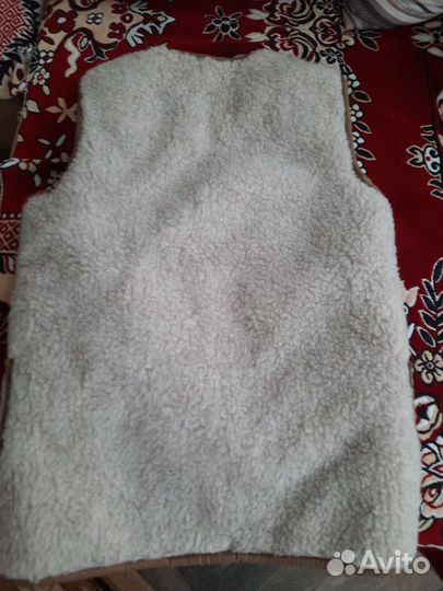 Меховая жилетка