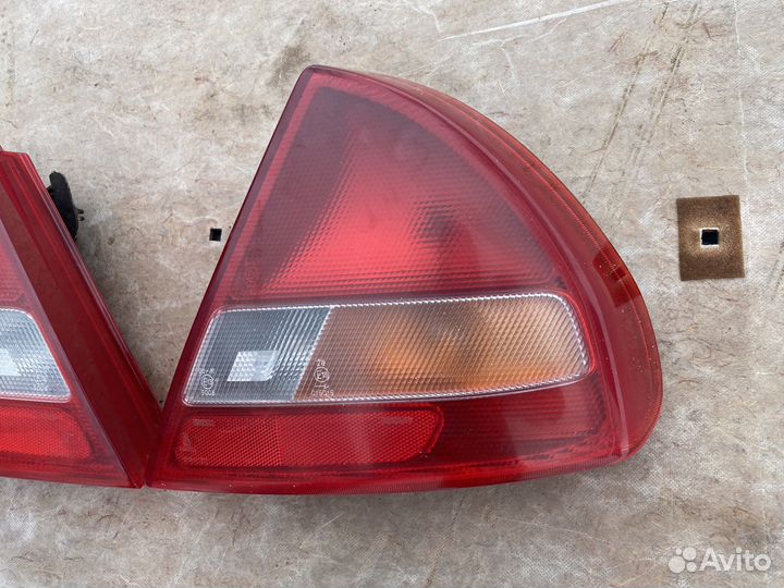 Фонарь левый правый Mitsubishi Lancer 6 Лансер VI