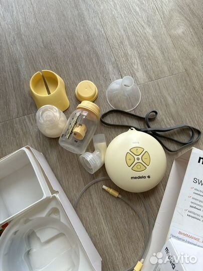 Молокоотсос medela электрический