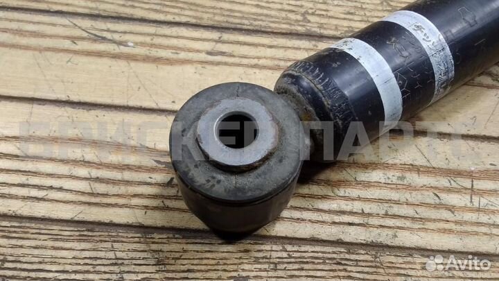 Стойка аморт левая Ниссан Тиида С11