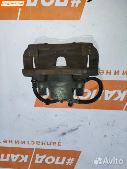 Суппорт тормозной передний левый Mazda 3 BK рест