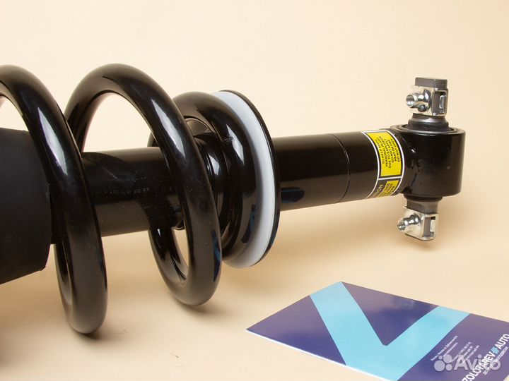 Передний амортизатор на Chevrolet Tahoe с пружиной