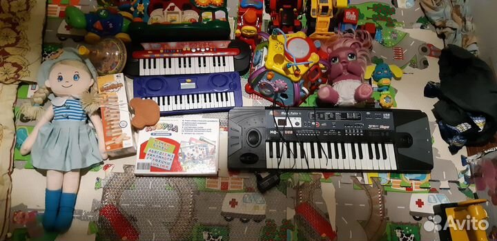 Развивающие и мягкие игрушки много