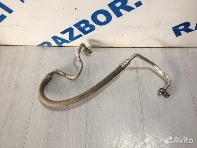 Трубка кондиционера длинная KIA RIO 2 JB рест 1.6