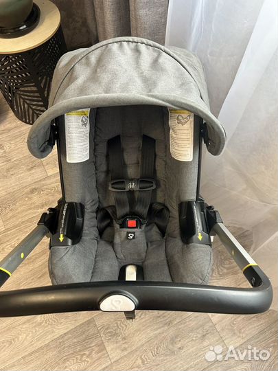 Коляска автокресло Doona с базой isofix