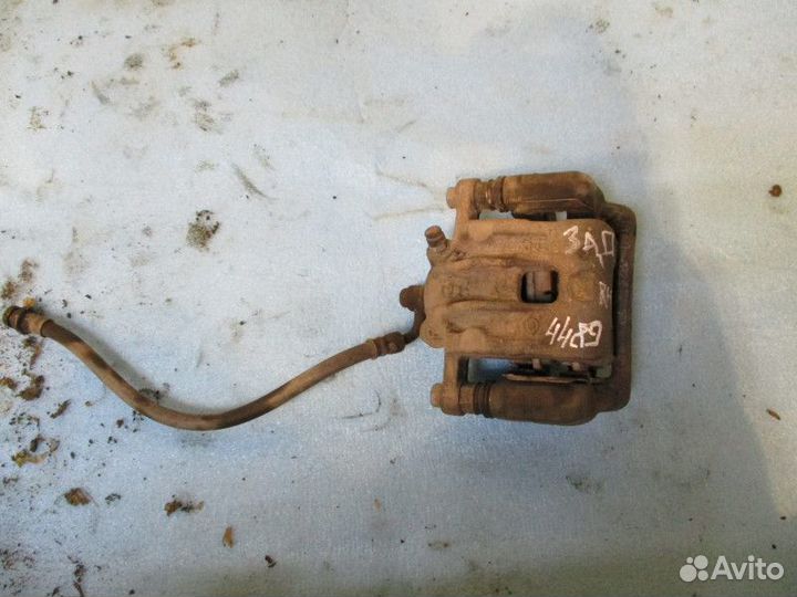 Суппорт задний правый SsangYong Actyon 2 (New) CK