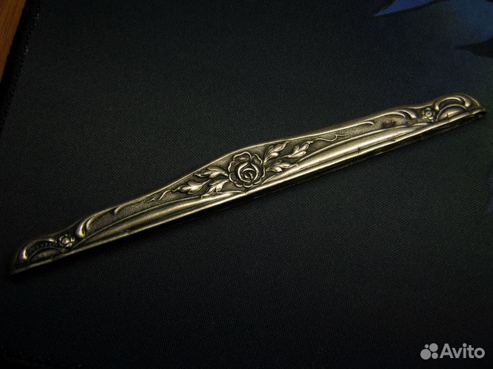 Серебряное навершие расчёски