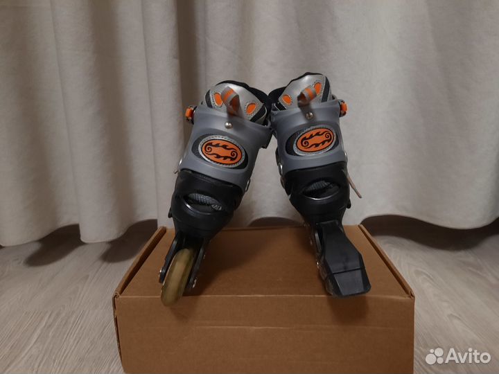 Роликовые коньки