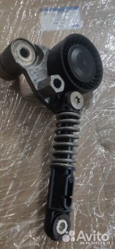 Натяжной ролик