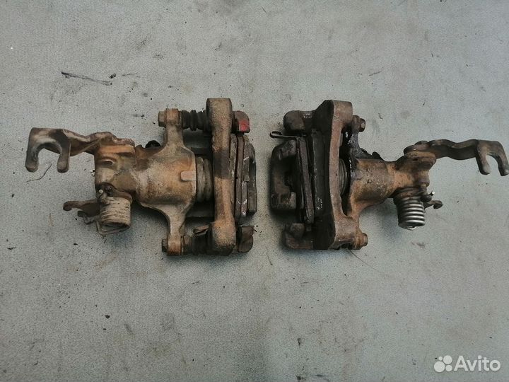 Суппорт тормозной задний для Nissan Maxima (A32)