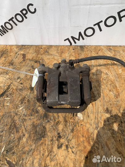 Суппорт тормозной задний правый Nissan X-Trail T31