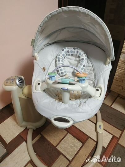 Детские электронные качели graco