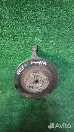 Кулак поворотный Mazda Familia,левый передний BJ8W