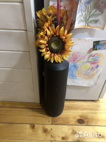 Наполняя ваза с цветами