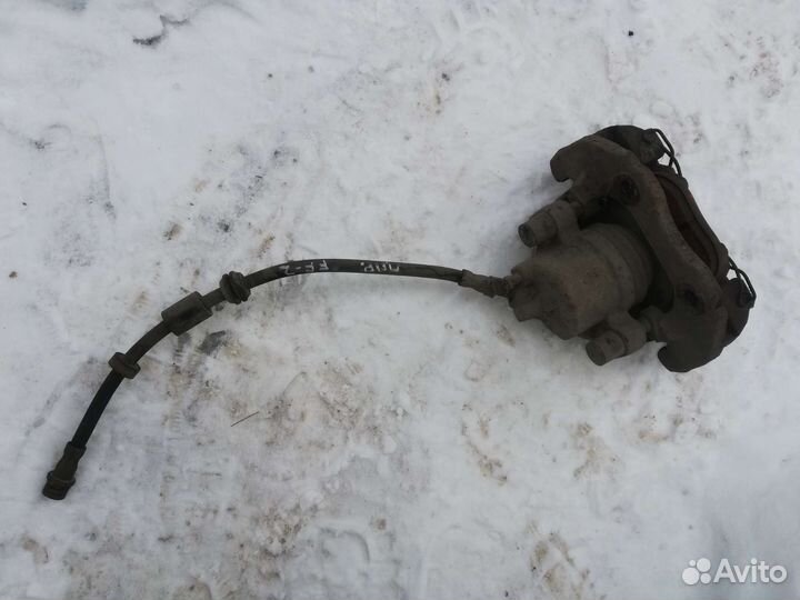 Суппорт тормозной передний Форд Фокус 2