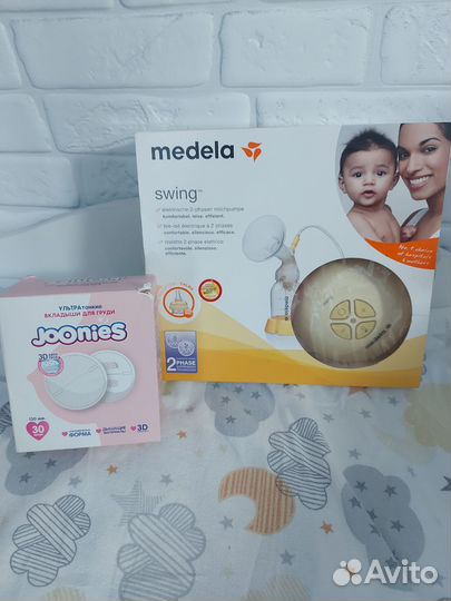 Молокоотсос medela swing электрический