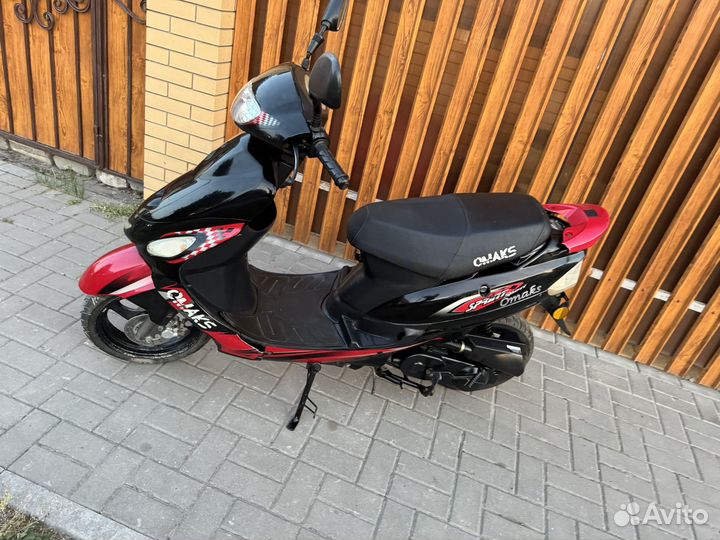 Скутер omaks