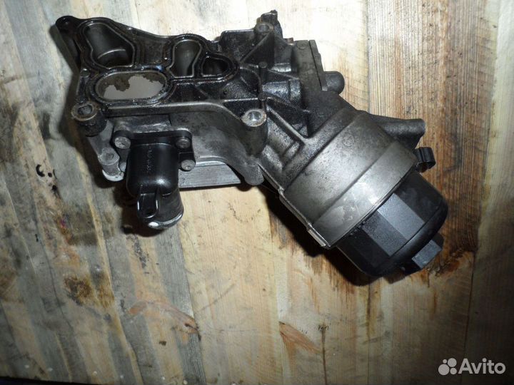 Радиатор масляный Opel Astra