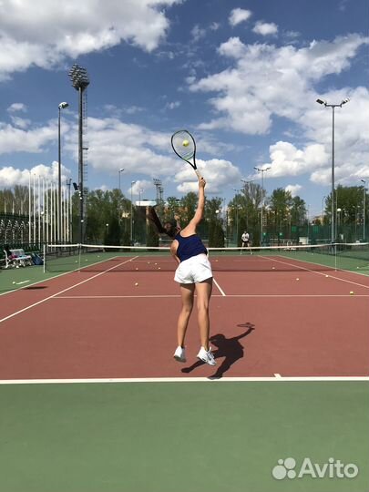 Тренер по большому теннису