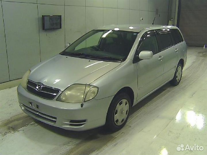 Тросик лючка бензобака Toyota Corolla fielder NZE121G