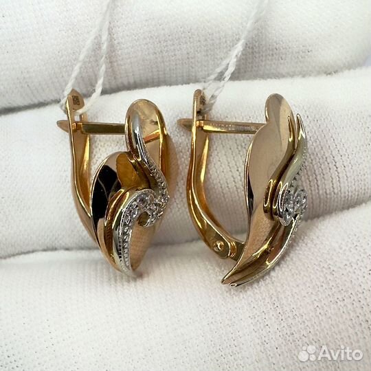 Золотые серьги с камнем