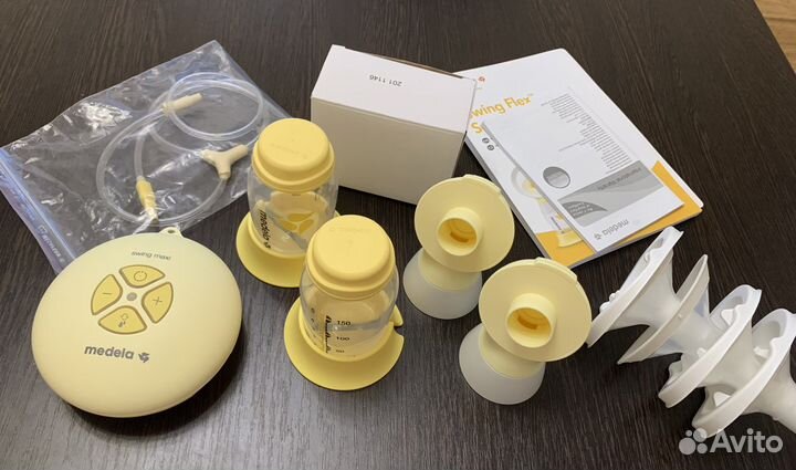 Молокоотсос medela swing maxi flex