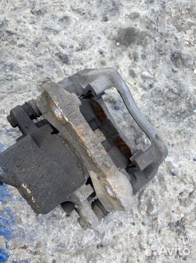 Тормозной суппорт Renault Logan