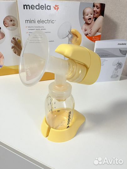 Молокоотсос medela электрический