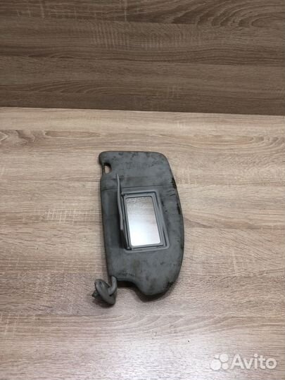Козырек солнцезащитный левый Ford Focus 2