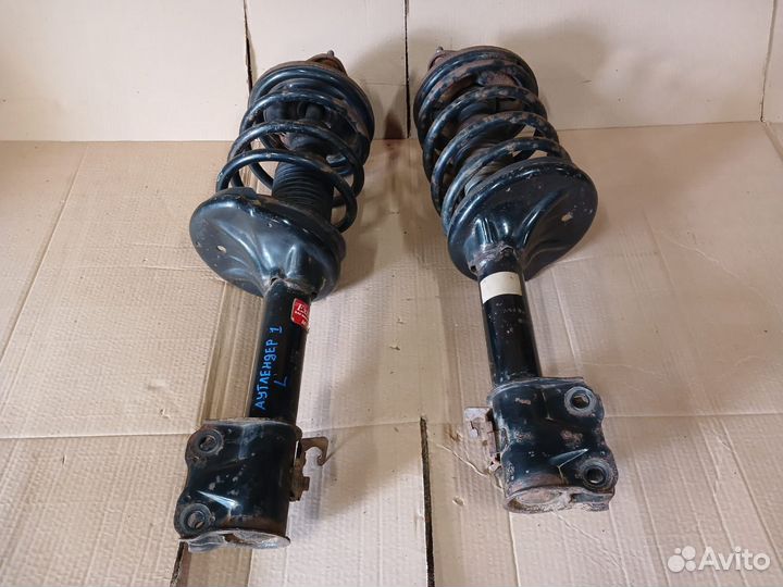 Передние стойки Mitsubishi Outlander 1