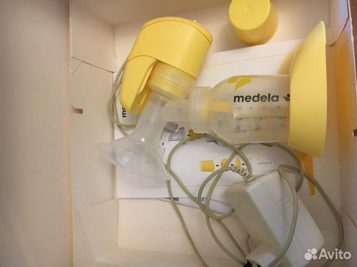 Молокоотсос электрический Medela mini electric