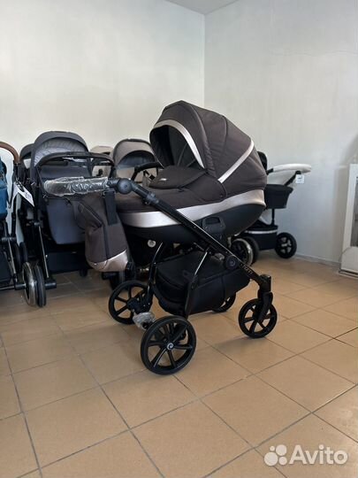 Tutis Nanni коричневая и черная Коляска с рождения