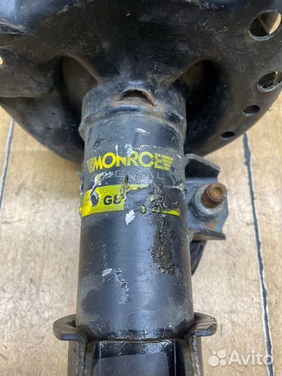 Стойка подвески передняя левая Opel Astra J A17DTJ