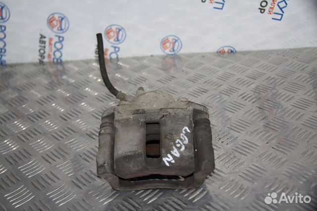 Суппорт передний правый Renault Logan 1