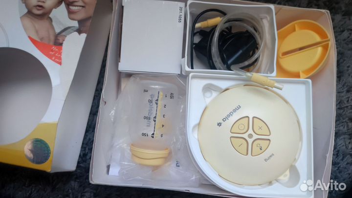 Молокоотсос medela swing