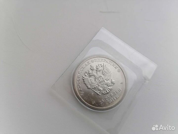 Монета новая