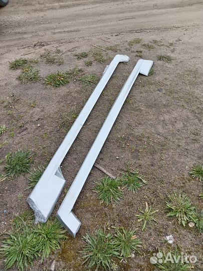 Накладки на пороги волга 31105