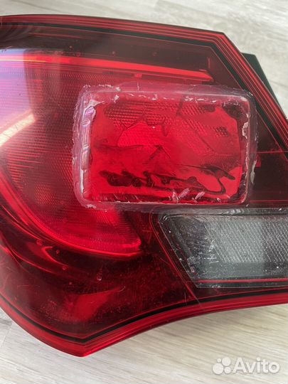 Задний левый фонарь Opel Astra GTS