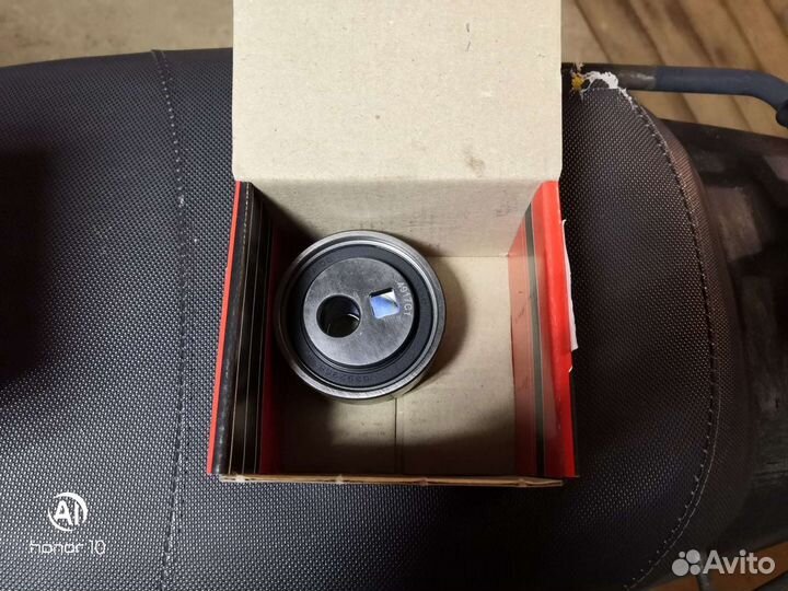 Натяжной ролик на пежо 206