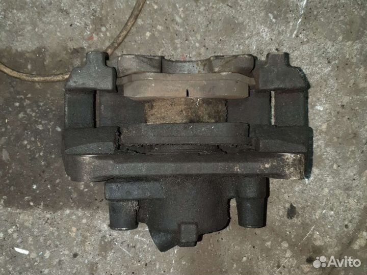 Суппорт тормозной Рено Меган 2 передний левый