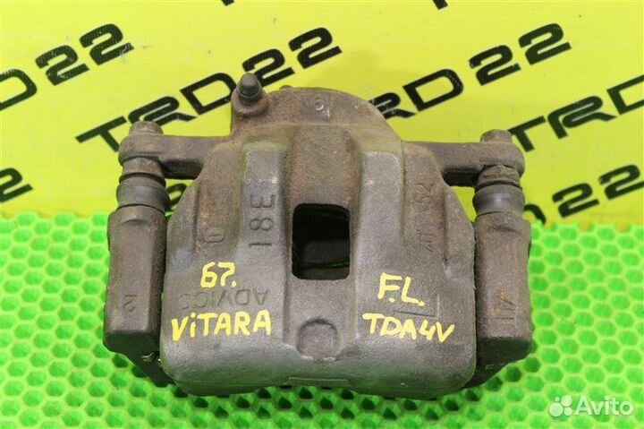 Суппорт тормозной передний левый Suzuki Grand