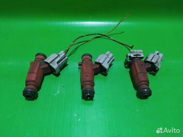 Форсунка топливная Nissan Almera N16 Primera P12